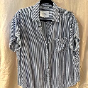 Pistola size small snap down blouse with blue and white stripes.